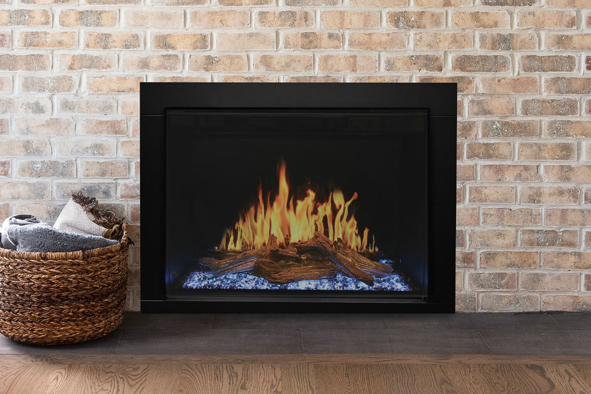 Electric fireplace insert installed in a brick surround with visible front vents